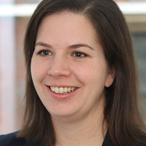 Head shot of Vicci Laslett smiling and looking away from camera