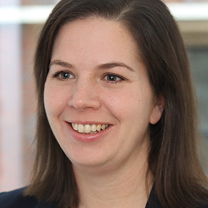 Head shot of Vicci Laslett smiling and looking away from camera