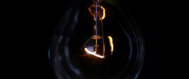 Close up of a dimly lit light bulb