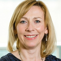 Head shot of Angharad Harris smiling into camera