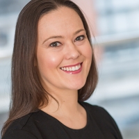 Head shot of Carolyn Bottomley smiling into camera