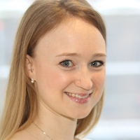 Head shot of Christina Muir smiling into camera