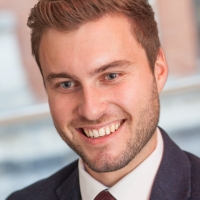 Head shot of Darren O'Leary smiling and looking away from camera