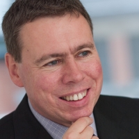 Head shot of David Jepps smiling and looking away from camera