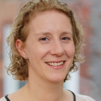 Head shot of Emma Clark smiling into camera