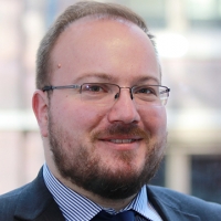 Head shot of Florian Albert smiling into camera