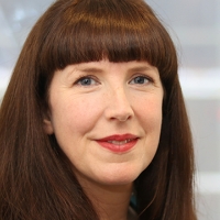 Head shot of Hazel Dawson smiling and looking into camera