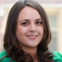 Headshot of Helen Calcutt wearing a green top looking into the camera