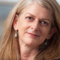 Head shot of Jacqueline McDermott smiling and looking away from camera