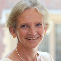 Head shot of Jane Harte-Lovelace smiling into camera