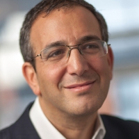 Head shot of Lawrence Abramson looking away from camera