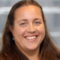 Head shot of Louise Knight smiling into camera