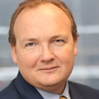 Head shot of Mark Beer looking into camera