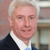 Head shot of Mark Harden smiling into camera