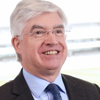 Head shot of Peter Garry smiling and looking away from camera