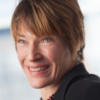 Head shot of Rachel Barber smiling and looking away from camera