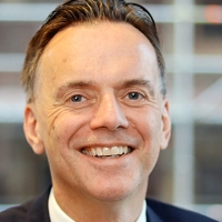 Head shot of Richard Temple smiling into camera