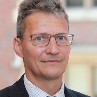 Head shot of Robert McLellan smiling into camera