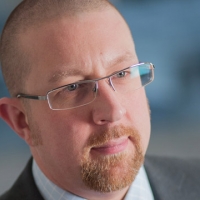 Head shot of Stuart Darlington looking away from camera