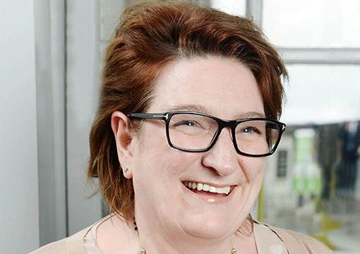 Head shot of Hilary O'Connor smiling and looking away from camera