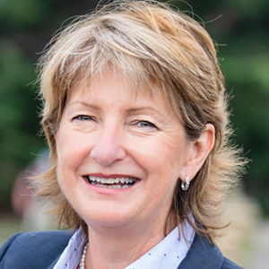 Head shot of Annabel Clark smiling into camera