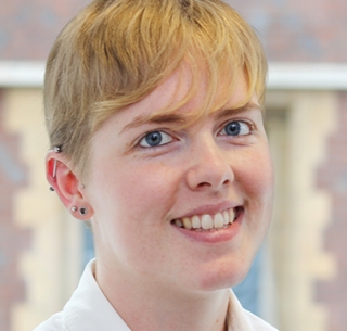 Head shot of Rebecca Gray smiling into camera