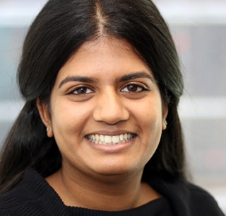 Headshot of Saunthary Ulakanathan smiling into camera