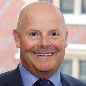 Head shot of James Lankshear smiling into camera