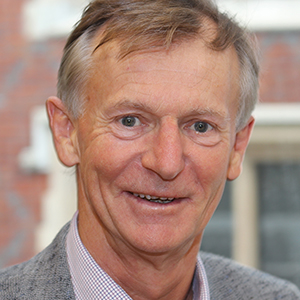 Head shot of David Heard smiling into camera