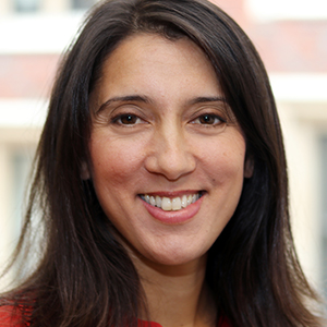 Head shot of Jayati Mitra-Valdes smiling into camera