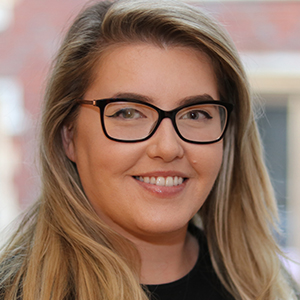 Head shot of Daniella Catorina smiling into camera