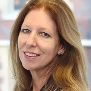 Head shot of Alison Moore smiling and looking into camera