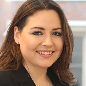 Head shot of Huguette Craggs smiling into camera