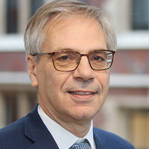 Head shot of Robert Eldridge smiling into camera