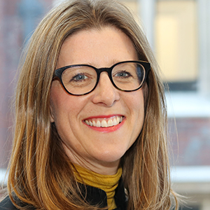 Head shot of Julie Morris smiling into camera