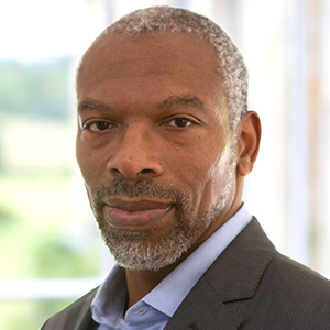 Head shot of Chidi Egbochue looking into camera