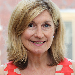 Head shot of Isobel Mundy smiling into camera