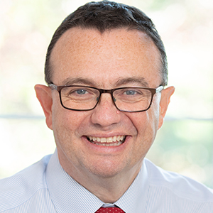 Head shot of Chris Bannister smiling into camera