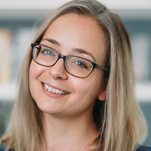 Head shot of Kate Hathaway smiling into camera