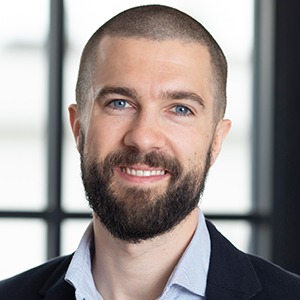 Head shot of Nick Weaser smiling into camera