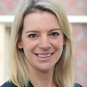 Head shot of Nicole Jahanshahi smiling into camera