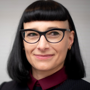 Head shot of Yohanna Weber looking away from camera