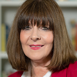 Head shot of Fiona Nicolson smiling into camera