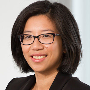 Head shot of Elaine Chan smiling into camera