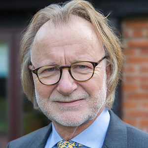 Head shot of John Downing looking into camera