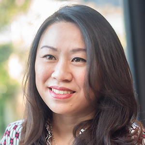 Head shot of Christine Chiew smiling and looking away from camera