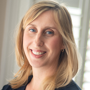 Head shot of Hannah Cornish smiling into camera