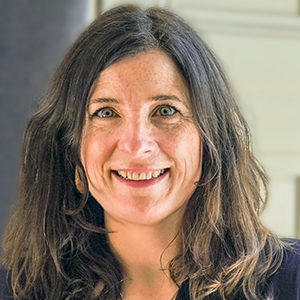 Head shot of Siobhan Moore smiling into camera