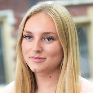 Head shot of Ava Murray looking away from camera