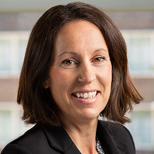 Head shot of Camilla Bishop smiling into camera